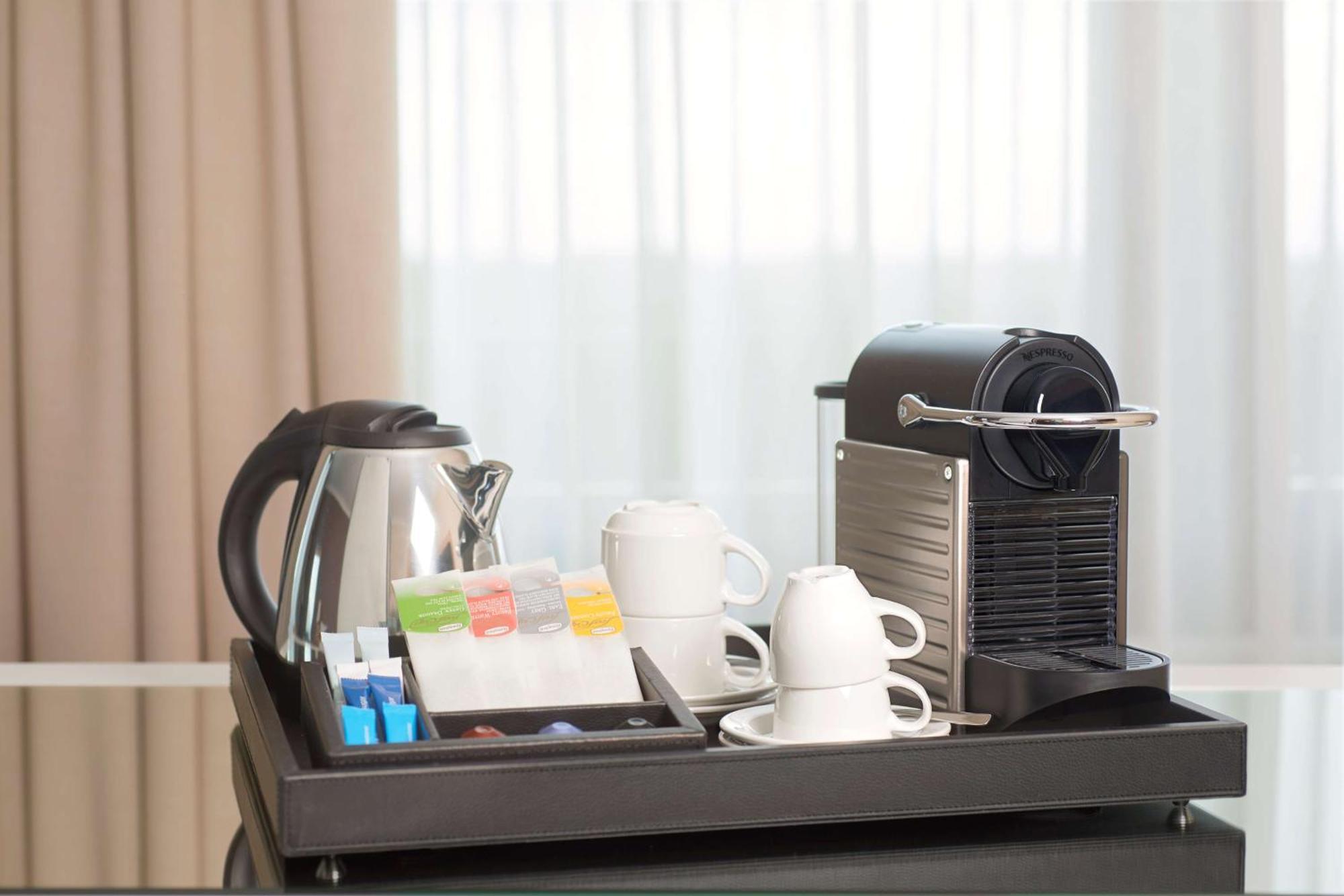 Hotel Nh Collection Plaza Santiago de Chile Zewnętrze zdjęcie A Nespresso coffee machine in a hotel room